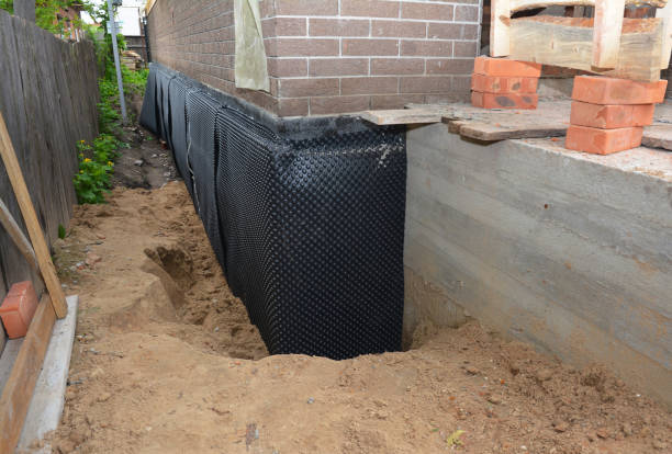 Happy homeowners after waterproofing job in Ottoville